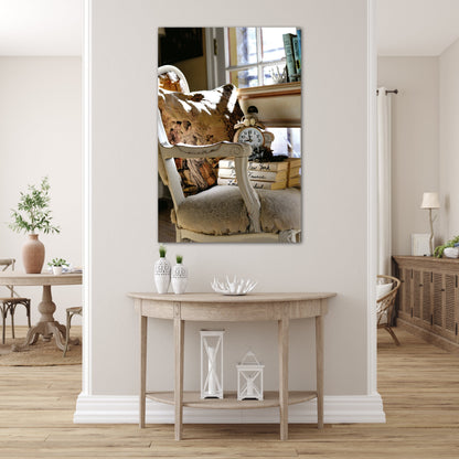 Antique chair, books, and clock in cottage home photography canvas print on wall