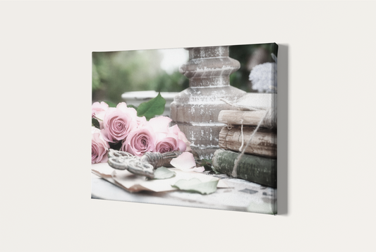 Antique roses, key, and books photography canvas print